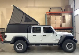 Best Truck Campers for Jeep Gladiator (2026) — What Actually Fits 5 Jeep Gladiator Rubicon with wedge-style pop-up truck camper