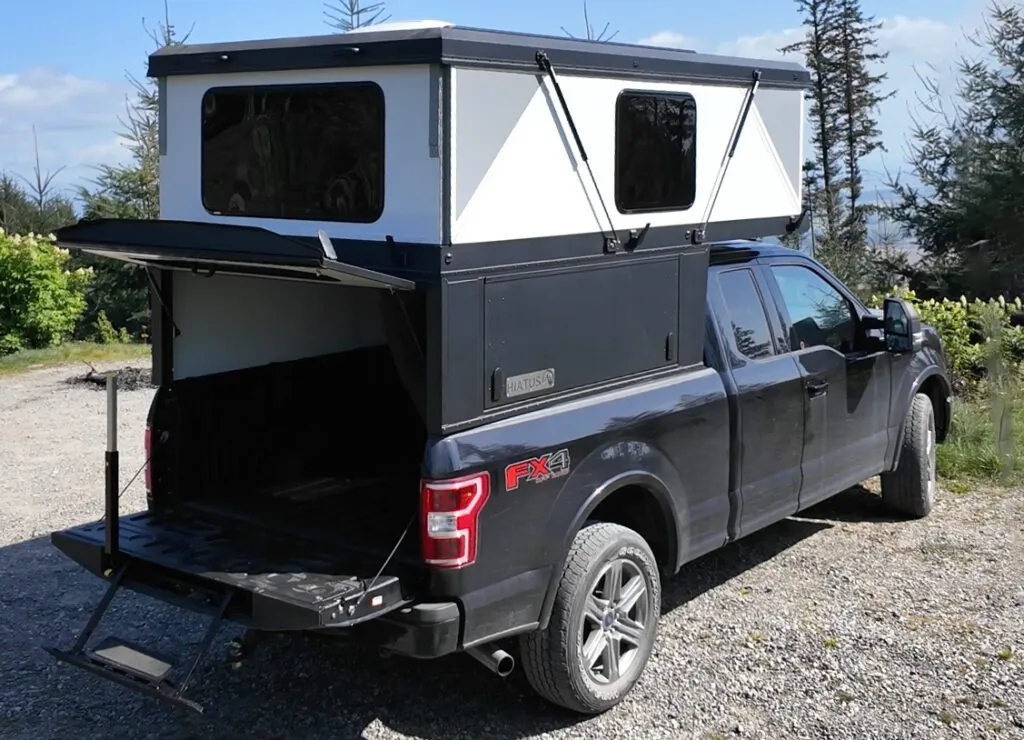 The 7 Best Wedge Campers & Canopy Campers for 2026 (Real Prices, Real Weights) 6 Hiatus Camper with hard-side folding walls raised