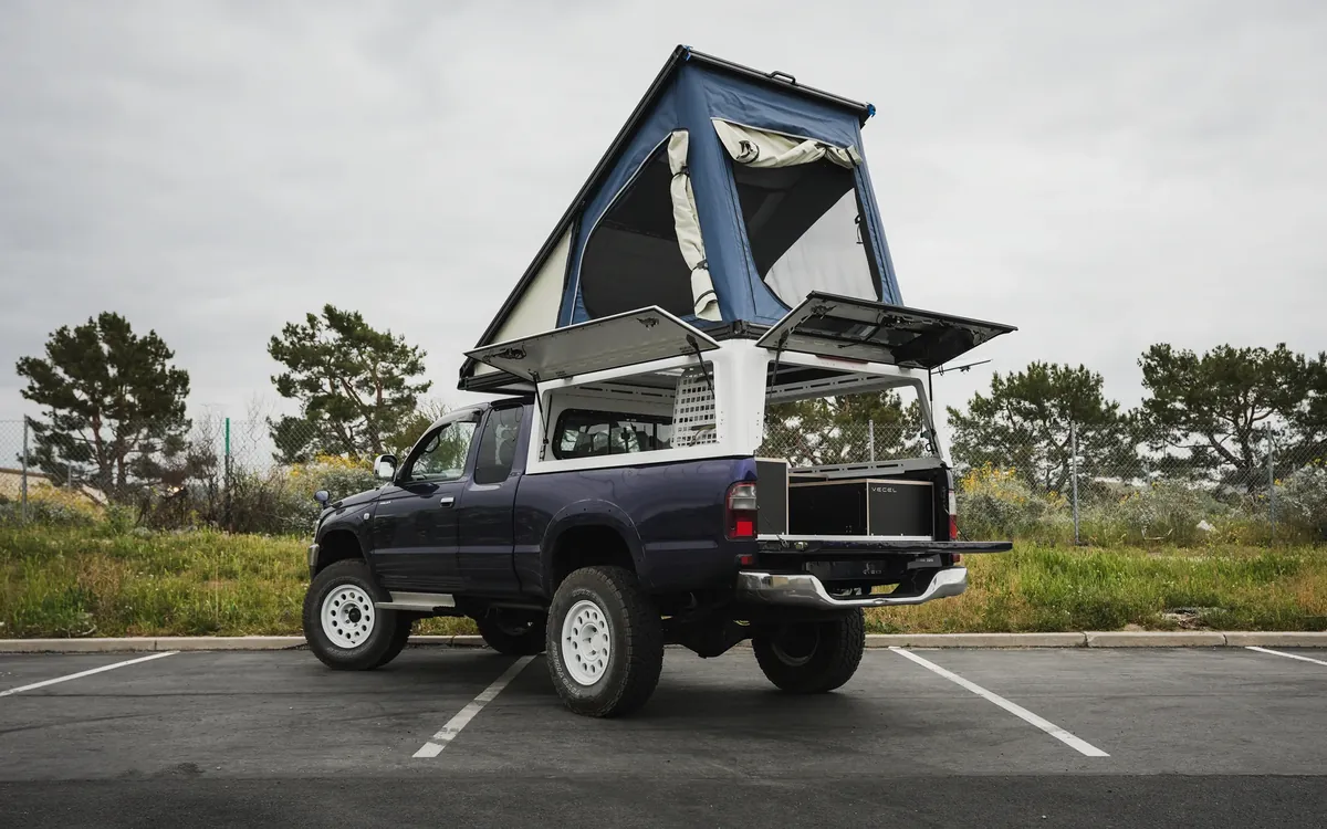 The 7 Best Wedge Campers & Canopy Campers for 2026 (Real Prices, Real Weights) 3 Super Pacific X1 wedge camper with canopy doors open