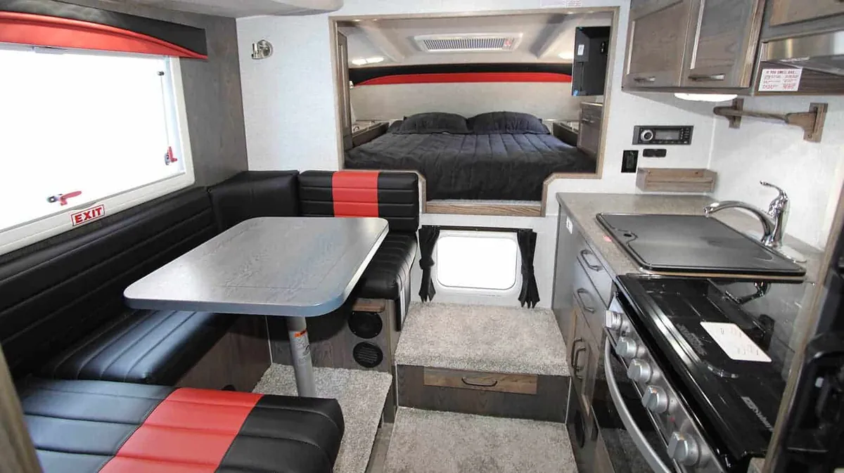Can You Ride in a Truck Camper? The 2026 State-by-State Guide 5 Truck camper interior with loose gear that becomes projectiles in a crash
