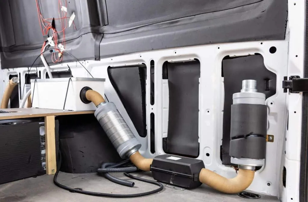How to Stop Condensation in a Truck Camper (2026 Definitive Guide) 3 Diesel parking heater installed in a camper