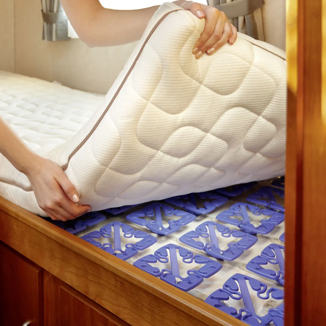 How to Stop Condensation in a Truck Camper (2026 Definitive Guide) 4 Mattress lifted to reveal the Froli spring system underneath, creating airflow that prevents moisture buildup