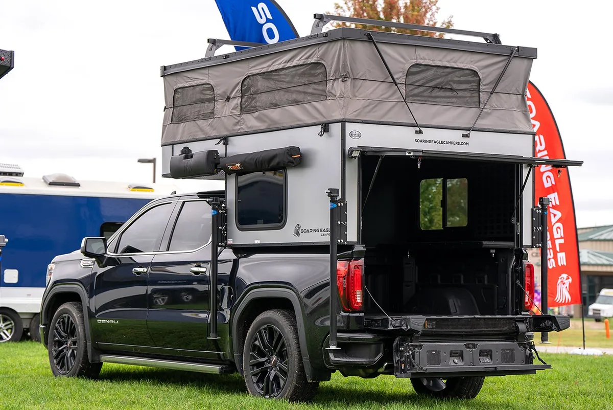 Best Truck Campers for Jeep Gladiator (2026) — What Actually Fits 4 Soaring Eagle OV-X 5.0 pop-up truck topper with roof raised