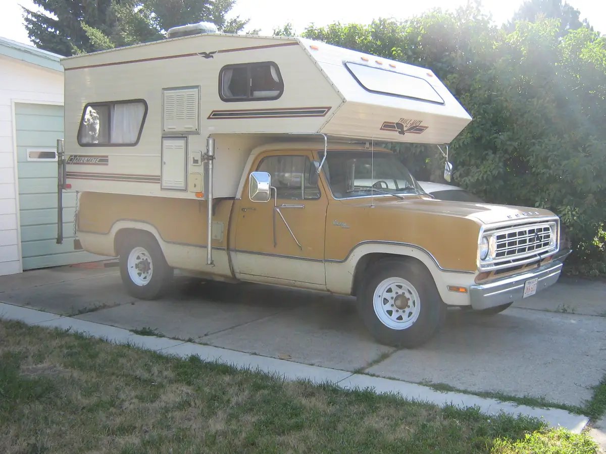 Vintage truck camper showing its age, illustrating how campers depreciate over the years