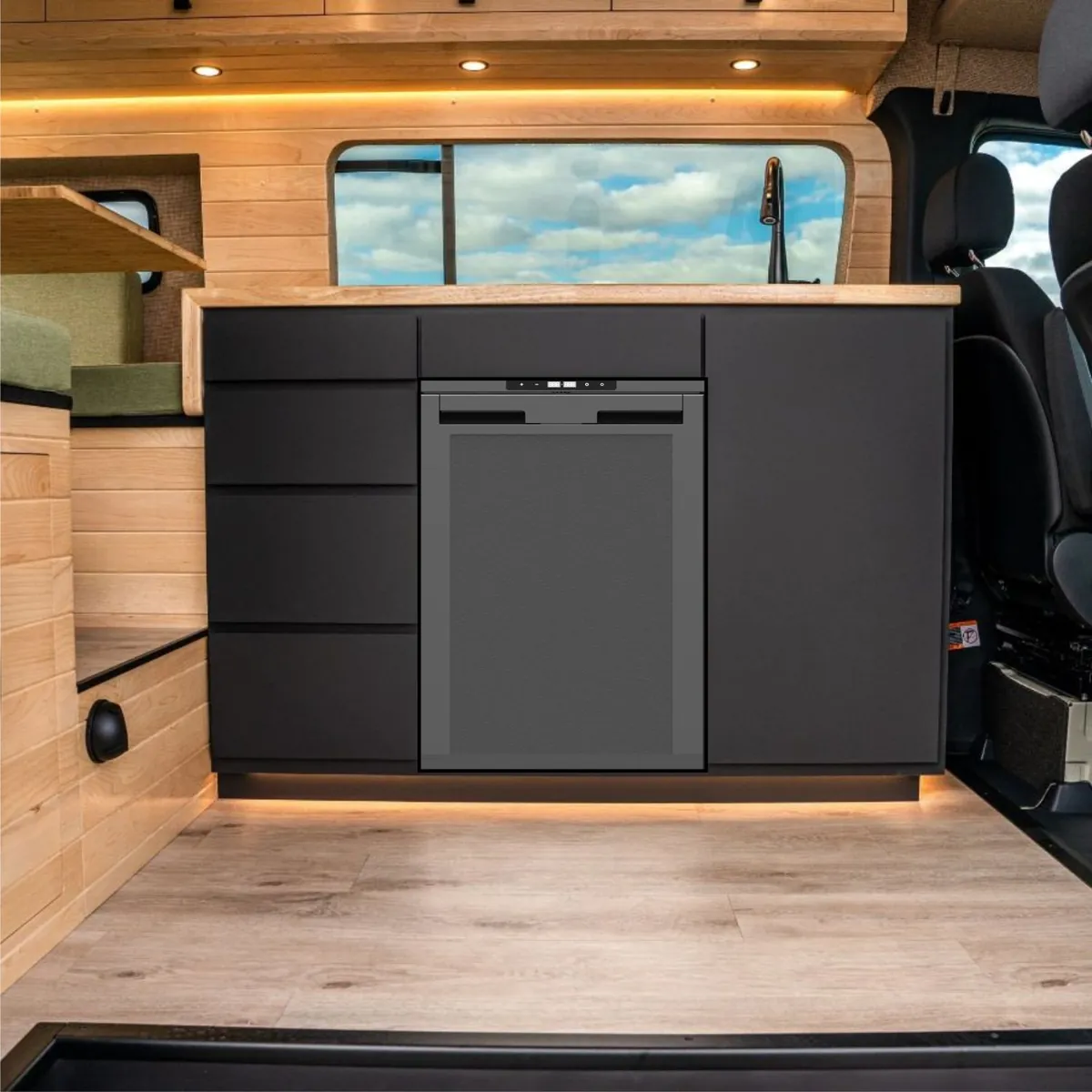 Truck Camper Solar Panels & Lithium Sizing Guide — How Big a System Do You Actually Need? 2 12V compressor fridge and LED lighting inside a camper van