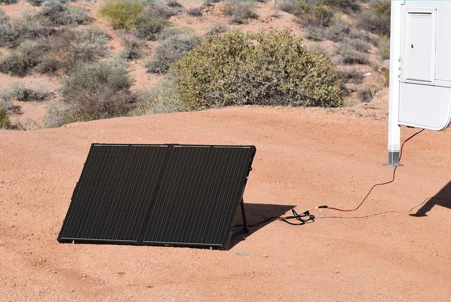 Truck Camper Solar Panels & Lithium Sizing Guide — How Big a System Do You Actually Need? 8 Portable ground solar panel at a truck camper boondock site