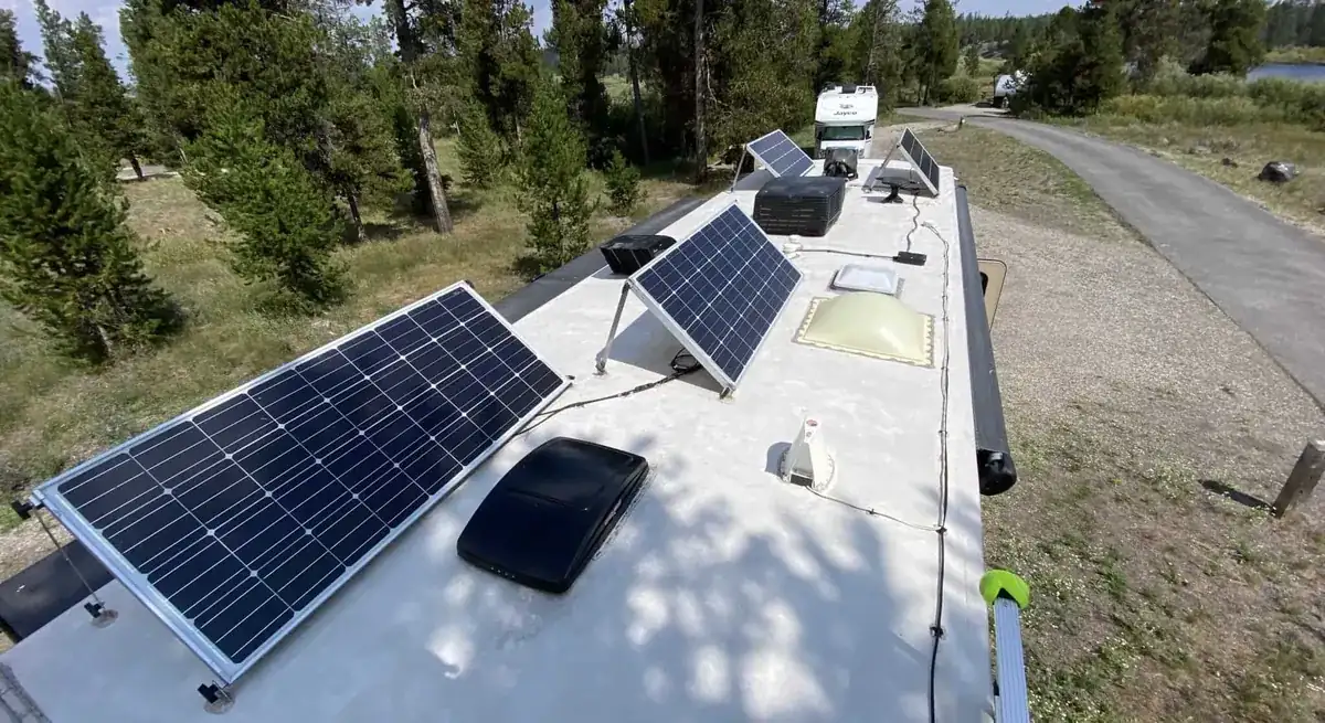 Truck Camper Solar Panels & Lithium Sizing Guide — How Big a System Do You Actually Need? 3 Rooftop solar panel array with tilt mounts on a camper